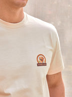 Camiseta premium exclusiva hombre perro raza Golden Retriever labrador 100% algodón orgánico gramaje alto 200 gramos heavy weight hecha en Portugal color avena vainilla oat premium moda masculina España Arzalè Majadahonda Pozuelo La Moraleja La Finca Encinar de Los Reyes Sancti Petri Formentera Sevilla Ibiza Madrid Barcelona