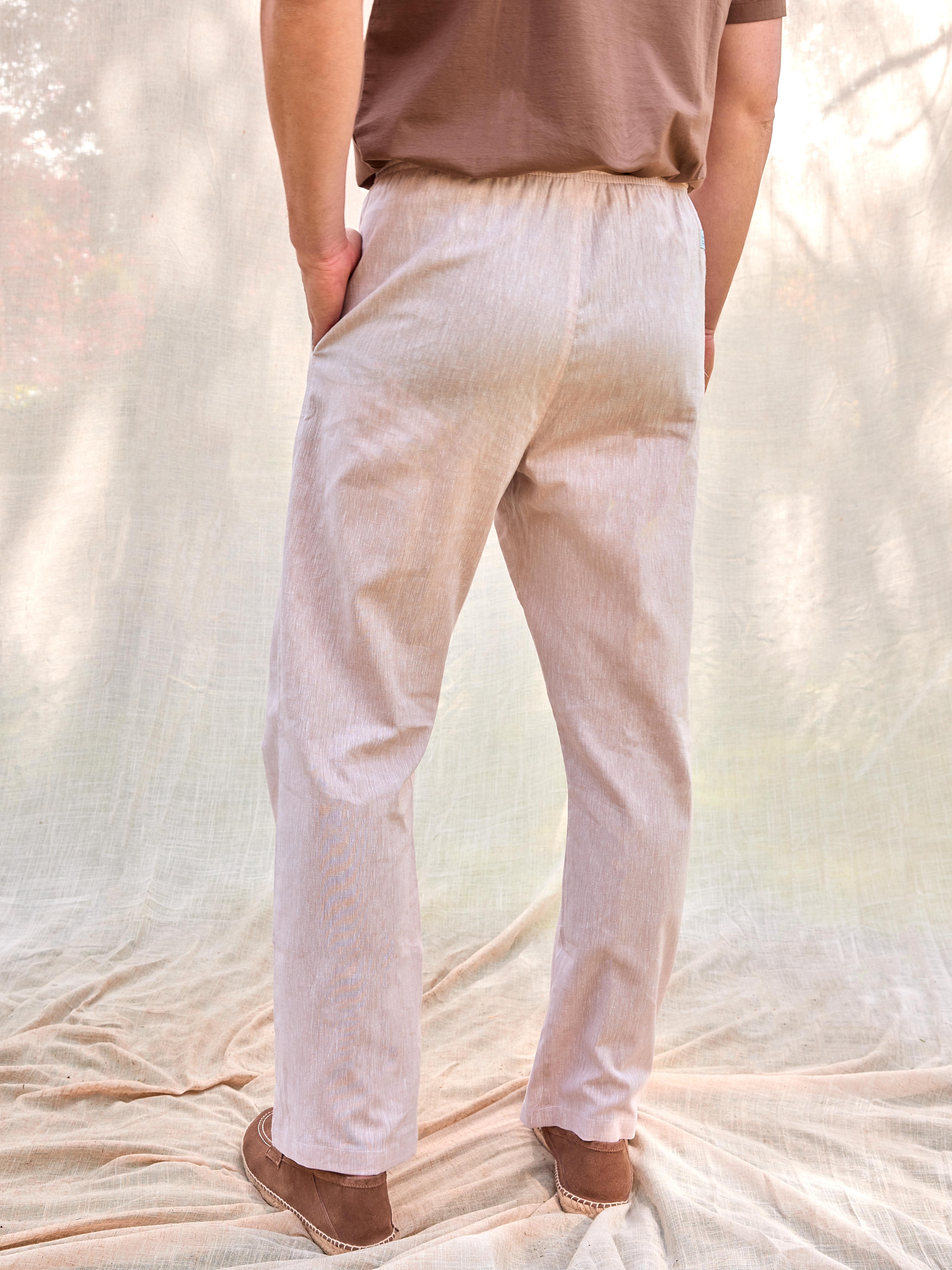 Pantalones verano tejido lino algodón hombre color blanco crudo beige arena cordones fluido verano hechos en España cómodos sin transparentar moda masculina premium Arzalè